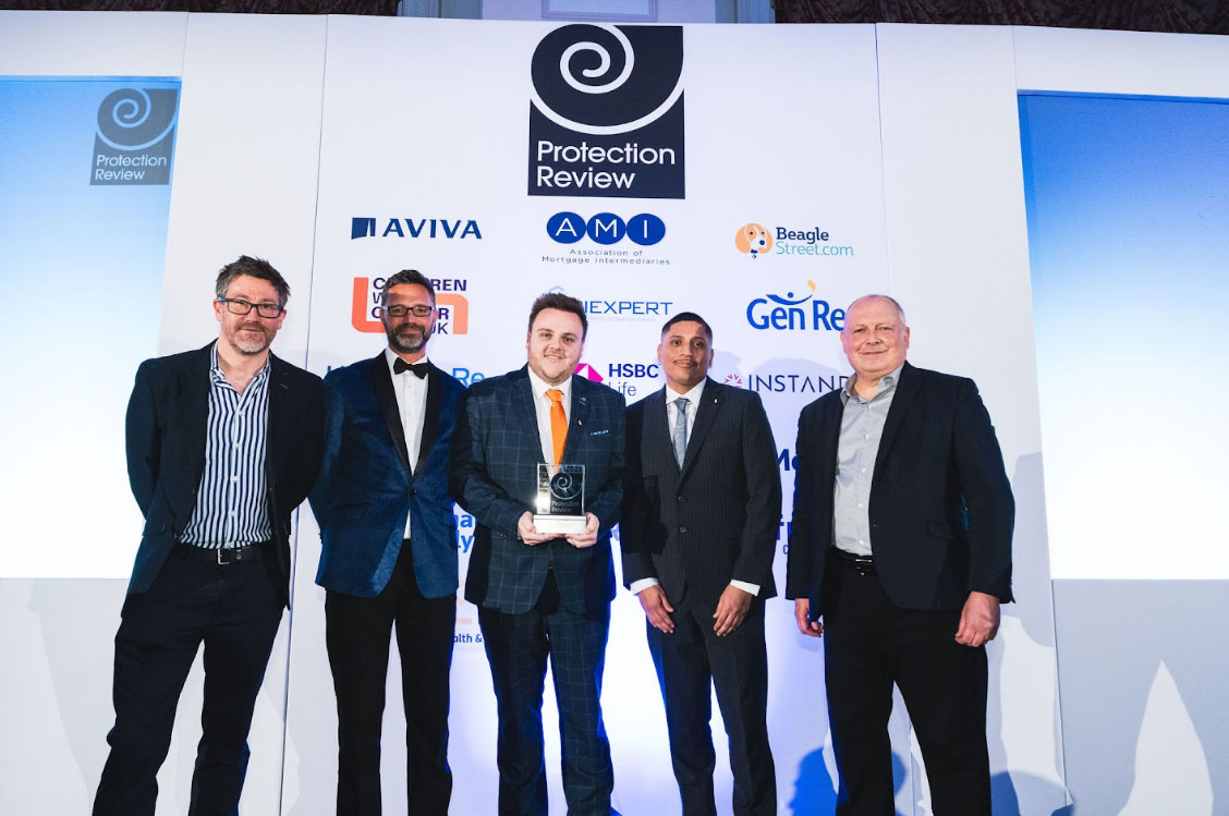 Waddle team receiving the Protection Review Awards 2025 trophy for Protection Intermediary of the Year